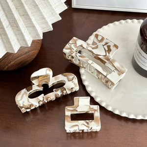 Three-piece set of acetate claw clips in creamy coffee marble pattern for women
