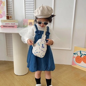 Kids cream crossbody bag with colorful unicorn print and blue denim overall dress