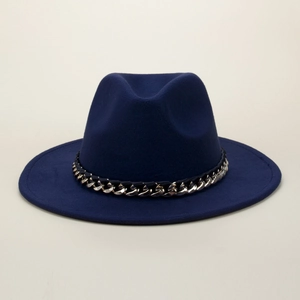 Detail of navy wool fedora hat featuring a chunky polished silver chain band decoration