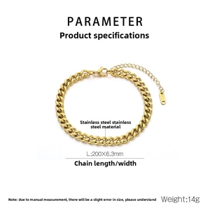 Detail of golden Cuban link anklet featuring lobster clasp and K18 metal tag parameters