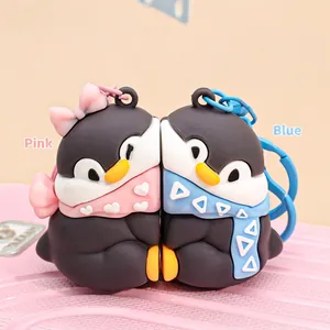 Cute magnetic penguin couple keychains in pink and blue for bags and gifts
