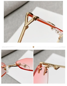 Detailed view of rimless sunglasses featuring Y-shaped gold hinges and pink gradient lenses