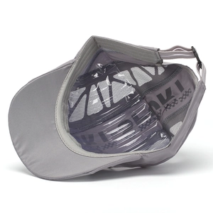 Detail of grey quick-dry baseball cap showing breathable mesh and adjustable strap buckle