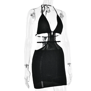 Close-up of black knit halter dress featuring sexy backless design and cutout details