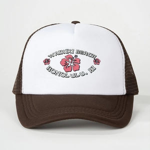 Détail de la casquette trucker avec motif fleur d'hibiscus rose et Waikiki Beach