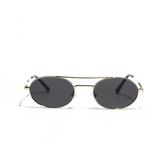 Retro oval sunglasses with gold metal frame and black lenses on white background