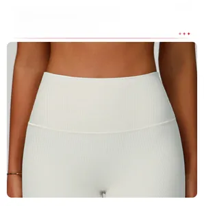 Macro shot of high-waist ribbed yoga shorts with tummy control wrap waistband