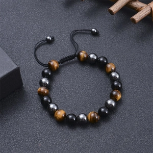 Adjustable 10mm tiger eye and lava stone beaded bracelet on black woven cord