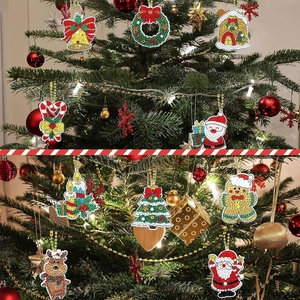 DIY Christmas diamond art keychains featuring Santa and reindeer on a tree