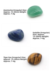 Polished tumbled stones including Aventurine, Sodalite and Tiger Eye for yoga healing