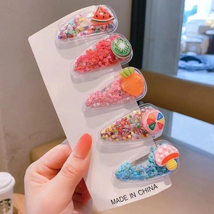 Detailed view of 5-piece set cartoon fruit and animal hair clips with colorful sequins