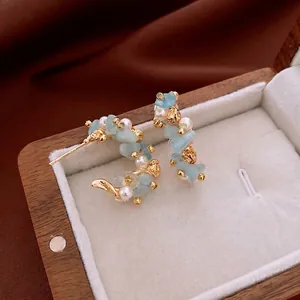 Aquamarine C-shape flower earrings with white pearls and gold metal base for women
