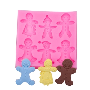 Pink silicone gingerbread man mold with six cavities for Christmas baking and DIY crafts