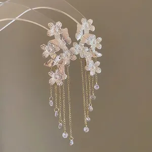 Silver needle butterfly flower earrings with long gold chain tassels and crystal pendants