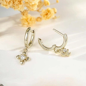 Vintage coffee gold hoop earrings featuring snowflake cross pendants with clear gemstones