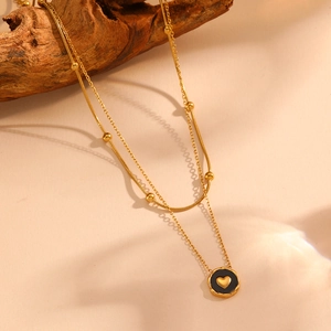 Collier double rang en acier inoxydable avec pendentif cœur noir et détails dorés