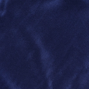 Macro shot of high-quality dark blue satin fabric with silky texture and fine weave
