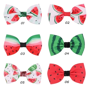 Six barrettes à nœuds avec différents motifs de pastèque pour enfants en vue grille