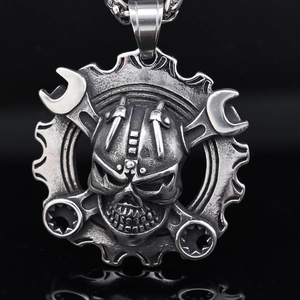 Gothic skull pendant with helmet and mechanical gear elements in vintage silver finish