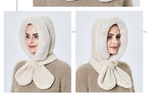 Detail of cream plush hooded scarf with faux fur trim and cross-style woven texture
