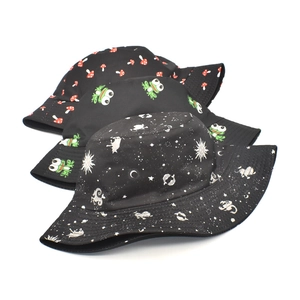 Detailed set of three black bucket hats featuring mushroom, frog, and galaxy patterns