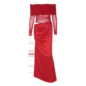 Detail of off-shoulder mesh sleeves and cutout waist on the elegant red satin dress