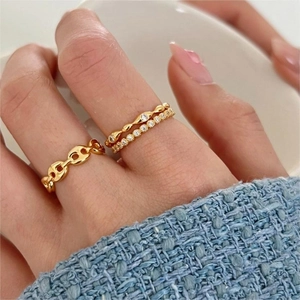 Three-piece minimalist gold 925 silver rings set featuring chain and zircon designs