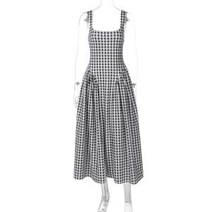 Detailed view of the black and white plaid sleeveless dress with a flared A-line skirt