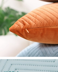 Detail shot of orange velvet pillowcase featuring embossed texture and invisible zipper