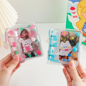 Sparkly PVC 3-hole mini photo albums in pink and blue with cute bunny charms