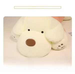 Close-up of the soft cream-white plush dog toy showing smooth texture and detailed paw pads