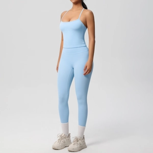 Detail view of light blue seamless yoga set with thin strap tank top and high waist leggings