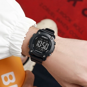 Detail view of the durable digital sports watch with black resin strap and waterproof case