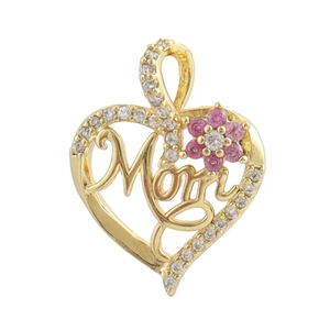 Macro shot of heart-shaped gold pendant with pink flower and Mom engraving with zircons