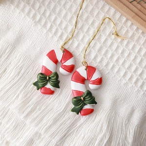Christmas candy cane hanging ornaments with red white stripes and green bow decoration
