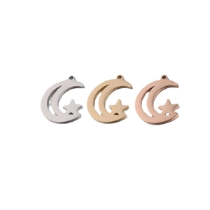 Set of three stainless steel moon and star pendants in silver, gold, and rose gold colors