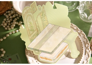 Detail of 3D decorative stickers in vintage interior style placed on a white relief plate