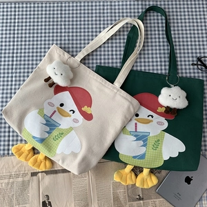 Cute duck canvas tote bags in white and green featuring plush cloud charms and duck feet