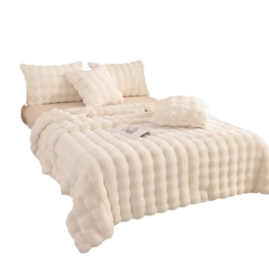 Plush cream faux fur blanket set with wavy 3D stripe texture and matching pillows