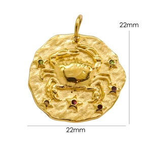 Close-up of 22mm 14K gold stainless steel Cancer zodiac pendant with colorful gems
