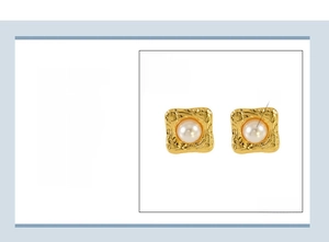 Macro detail of square 18K gold plated stainless steel stud earrings with white pearl inlay