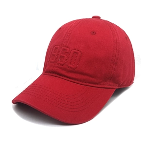 Detail of 3D embroidered 1950 text on high-quality red cotton twill baseball cap