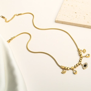 Gold plated stainless steel necklace with turquoise evil eye and teardrop pendants