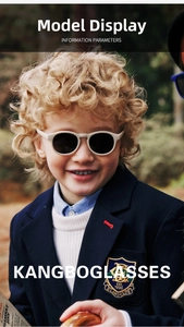 Toddler wearing beige round silicone sunglasses with polarized lenses for UV protection