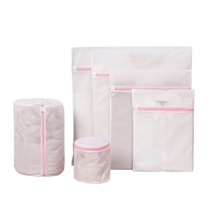 Six-piece set of polyester mesh laundry bags with pink zippers for washing machines