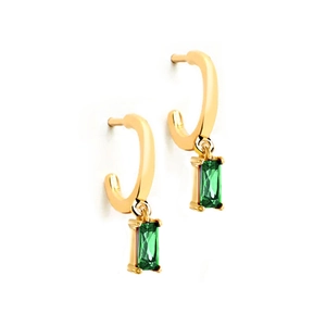 Detail of gold geometric C-shaped earrings with emerald green rectangular gemstones