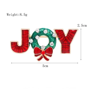 Detail view of colorful JOY Christmas brooch with dimensions 5cm and 8.5g weight