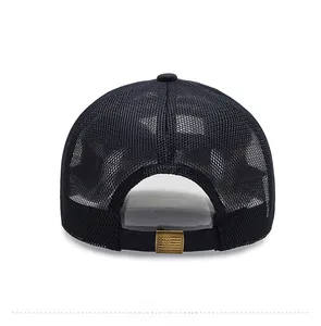 Detail of black mesh baseball cap showing breathable fabric and bronze American flag buckle