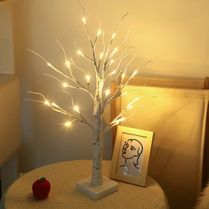 Illuminated white birch tree lamp with warm LED lights for Christmas home decor