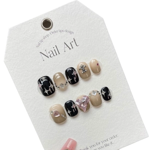 Handmade gradient press-on nails with black lacquer, 3D hearts, and silver cross motifs